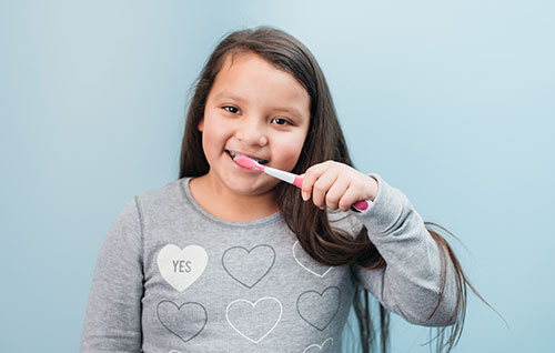 Child Brushing Teeth